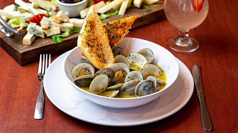 Clams appetizer with side of bread