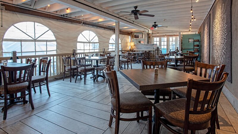 Patio seating with many set tables