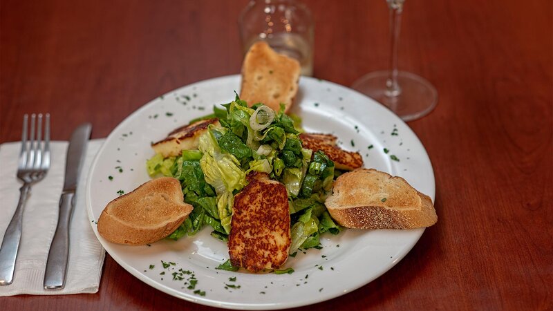 Lettuce salad with side of bread